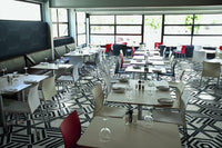 hexagon tile in a blend of cool patterns on a restaurant floor. 