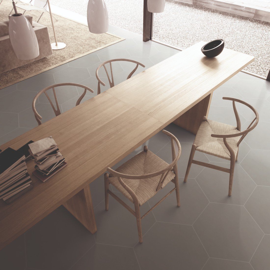 hexagon tile in ash grey with long natual wood table. 