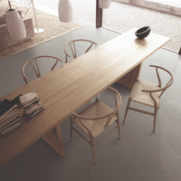 hexagon tile in ash grey with long natual wood table. 