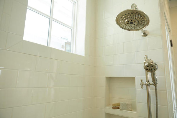 arctic white glossy subway tile in shower
